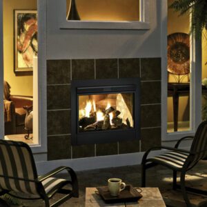 Outdoor seating area with fireplace and chairs.