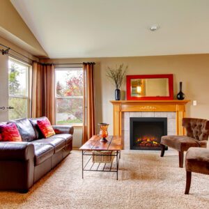 Cozy living room with fireplace and sofa.