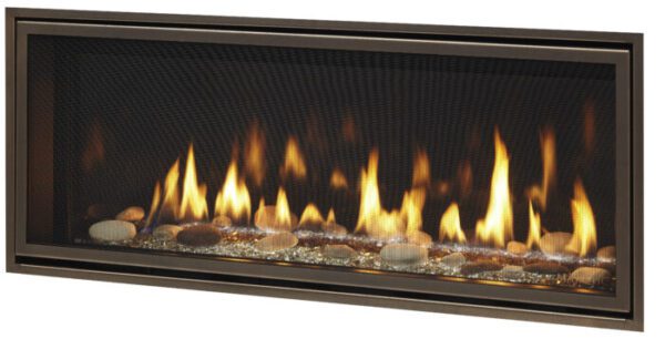 Modern fireplace with glowing flames and rocks.