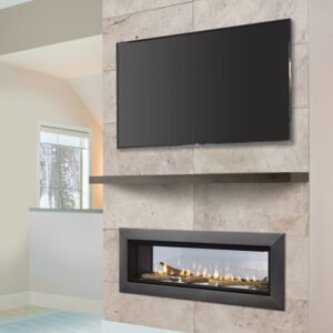 TV above modern fireplace in living room.