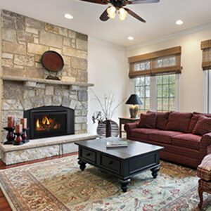 Cozy living room with stone fireplace.