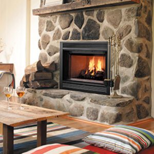 Stone fireplace with cozy burning fire.
